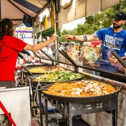 Use your free tickets to the annual Smoky Hill River Festival to sample local favorites and festival treats from dozens of food vendors throughout the park. (Image Credit: Smoky Hill River Festival)