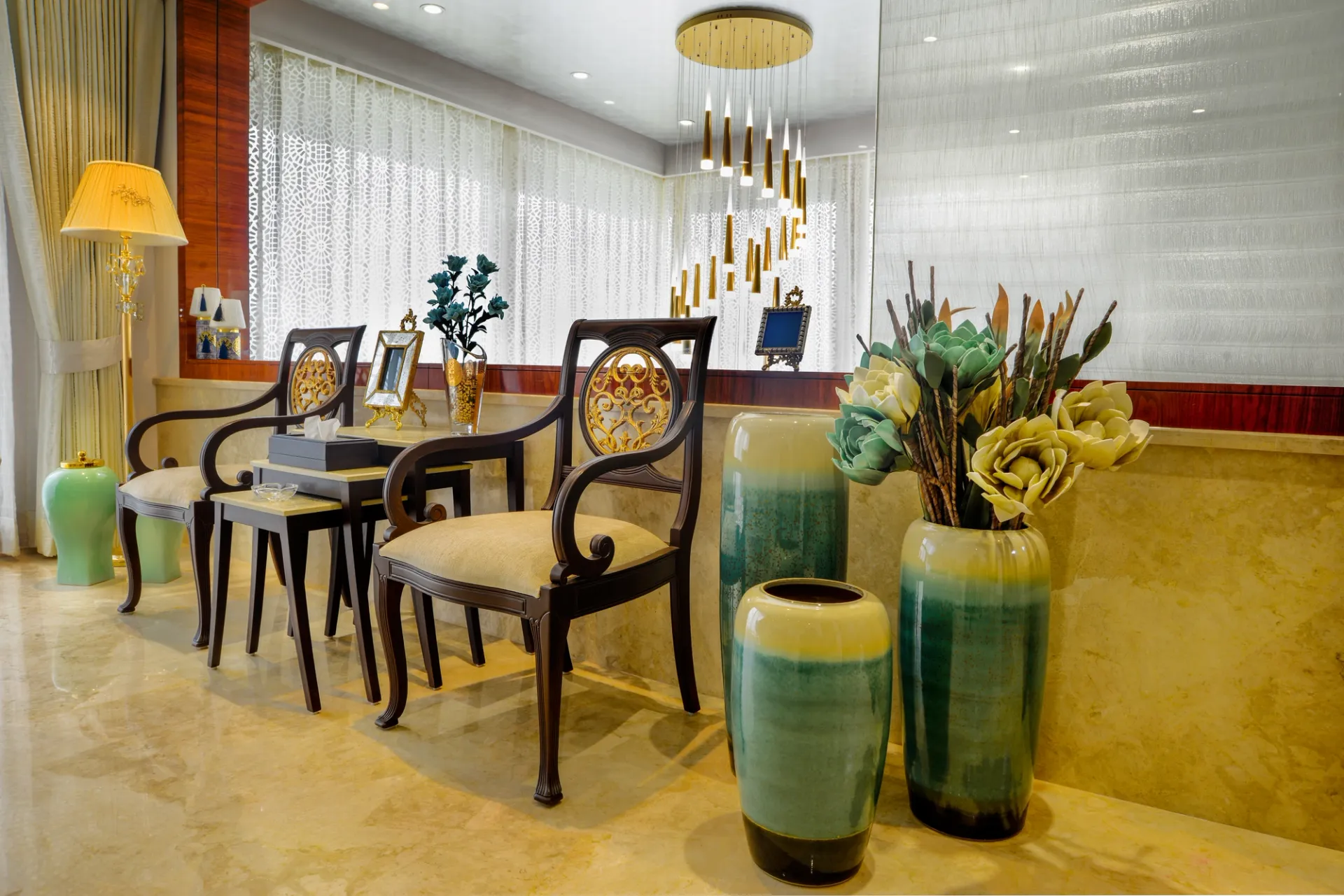 Marble lobby with bronze accents and botanical tapestry
