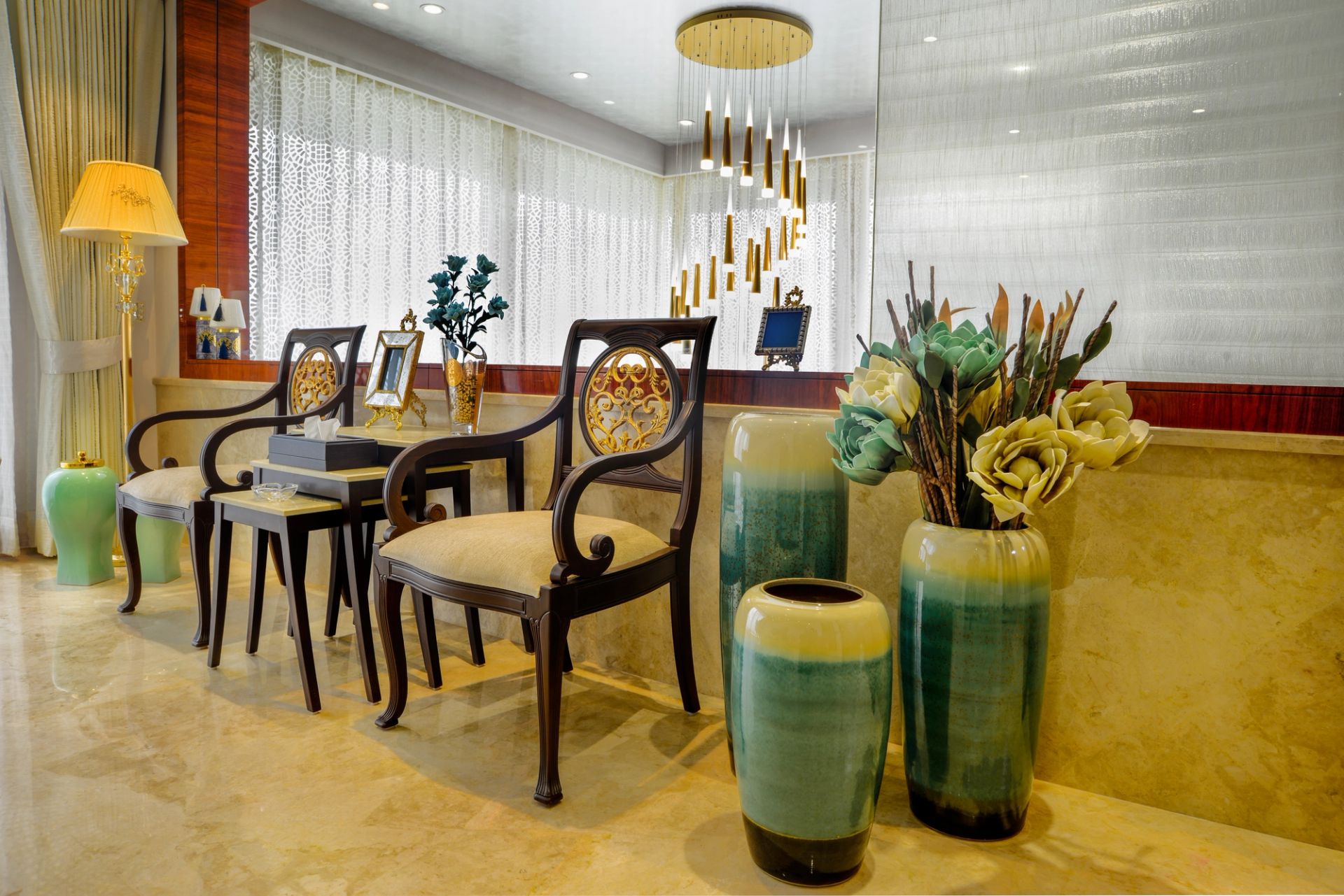 Marble lobby with bronze accents and botanical tapestry