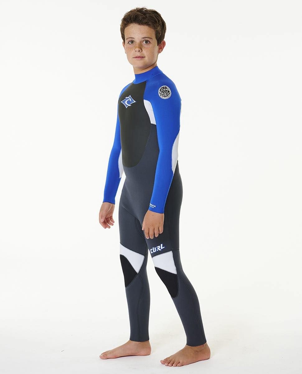 Young boy in a blue wetsuit