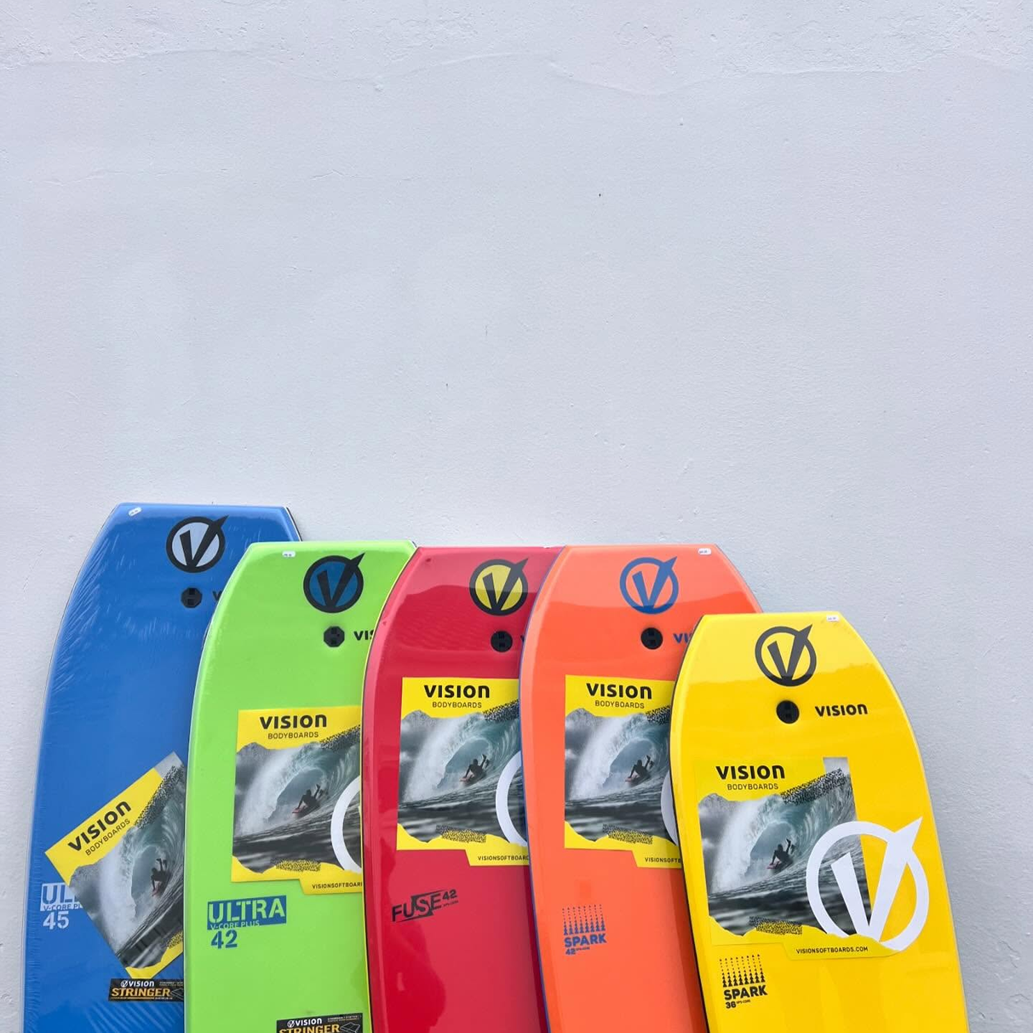 Multi coloured Vision surfboards