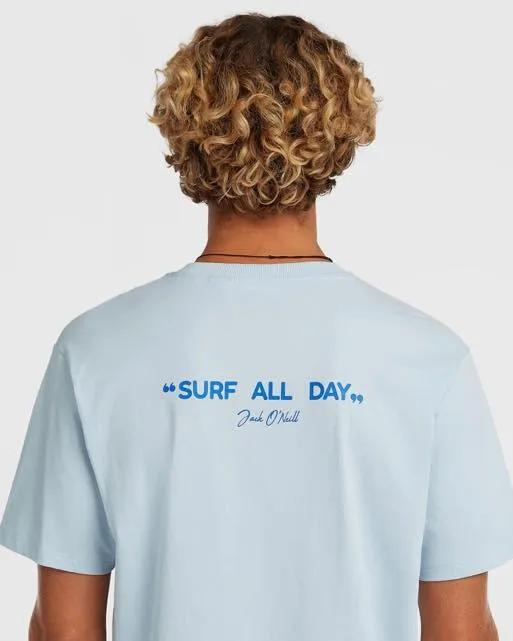 Young blonde man in surf all day shirt from behind