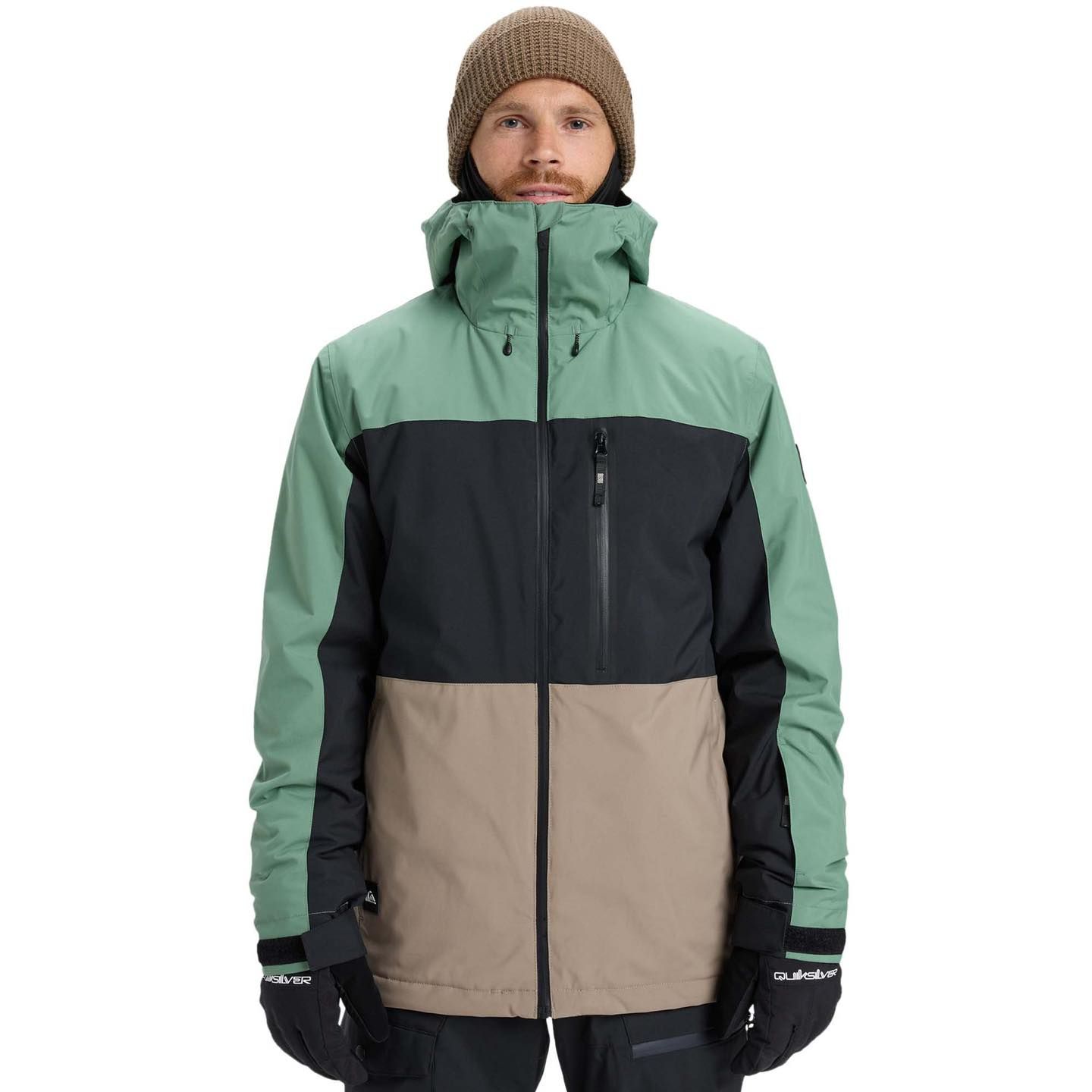 Man in brown hat and green, black and brown ski coat