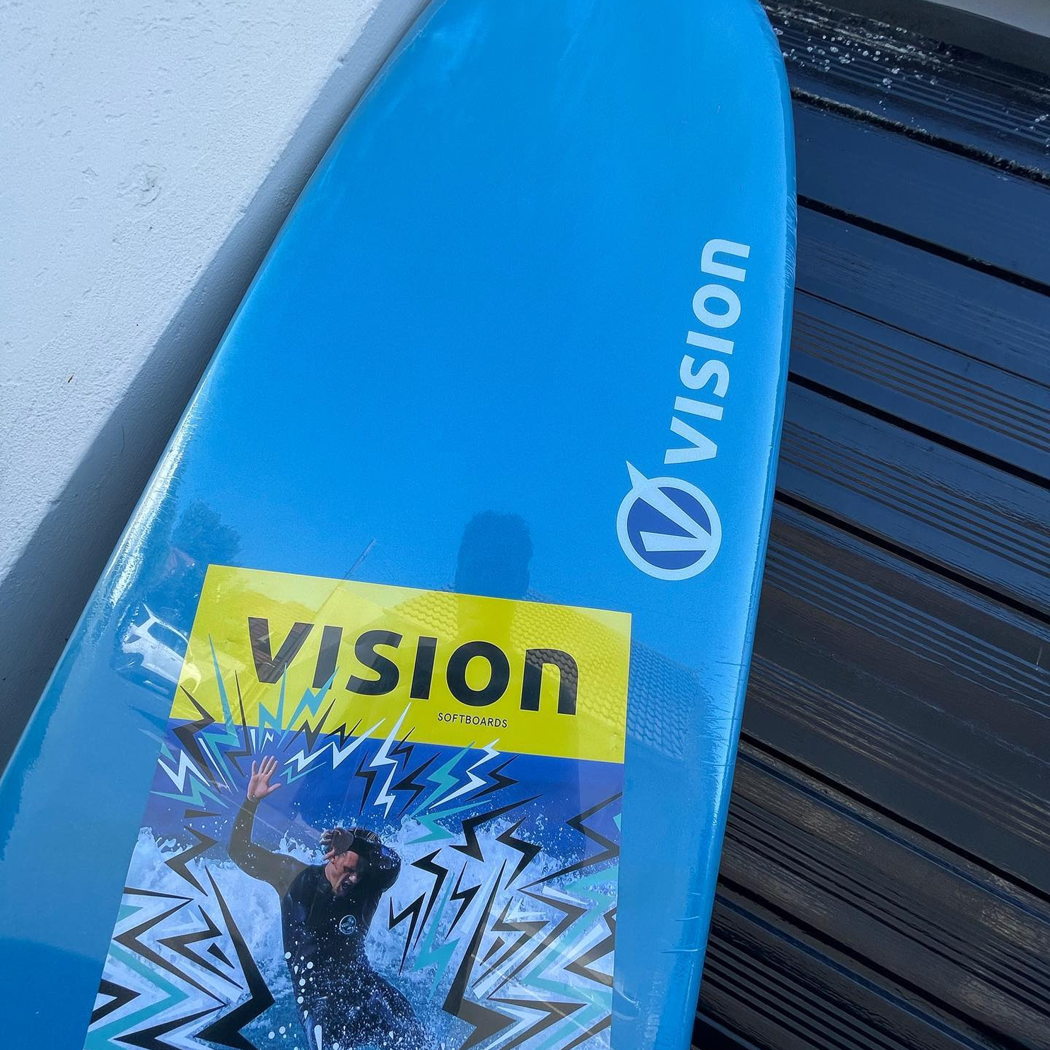 Close up of a vision blue surfboard