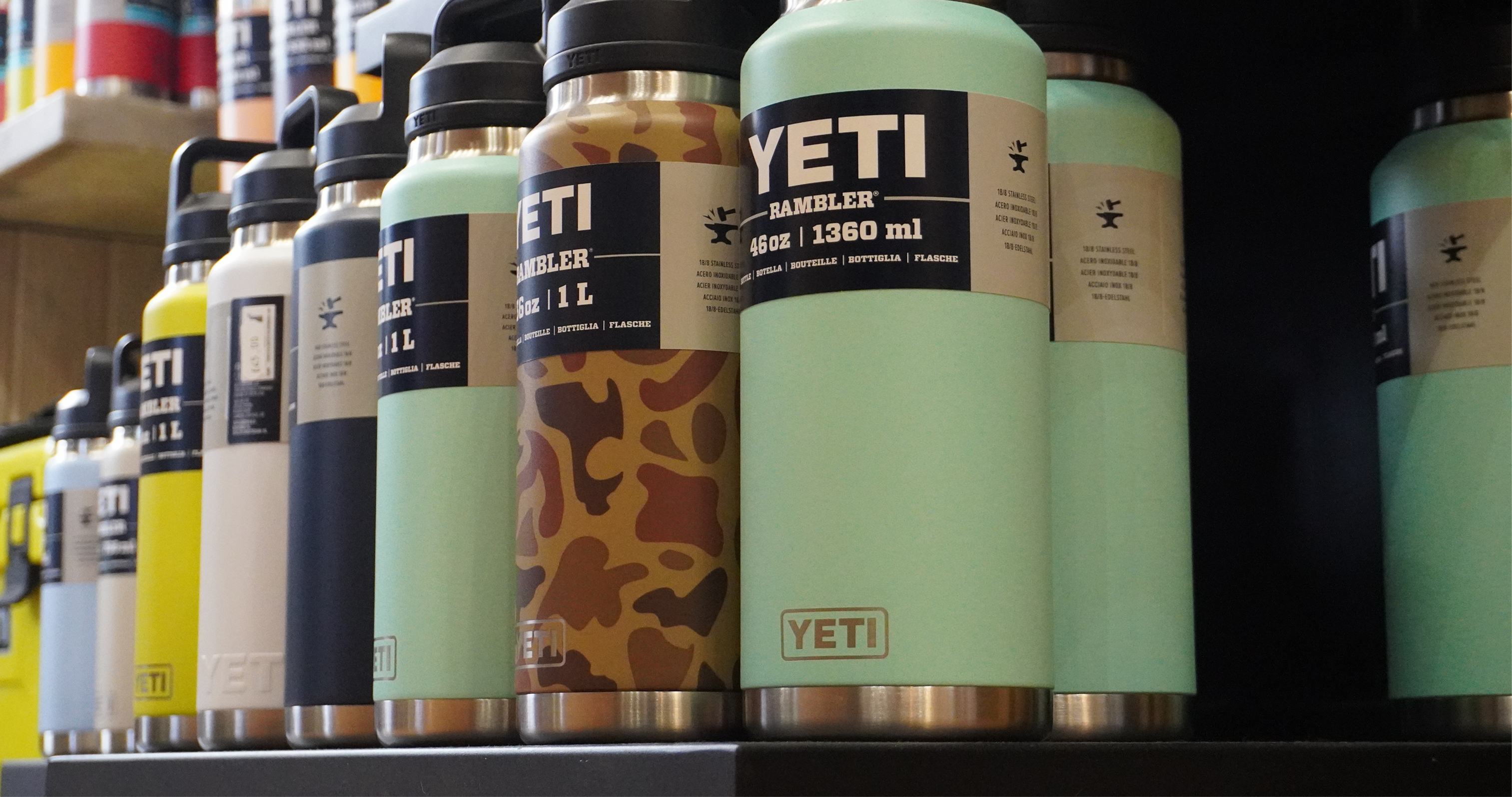 Different colour YETI flasks sitting on the shelf