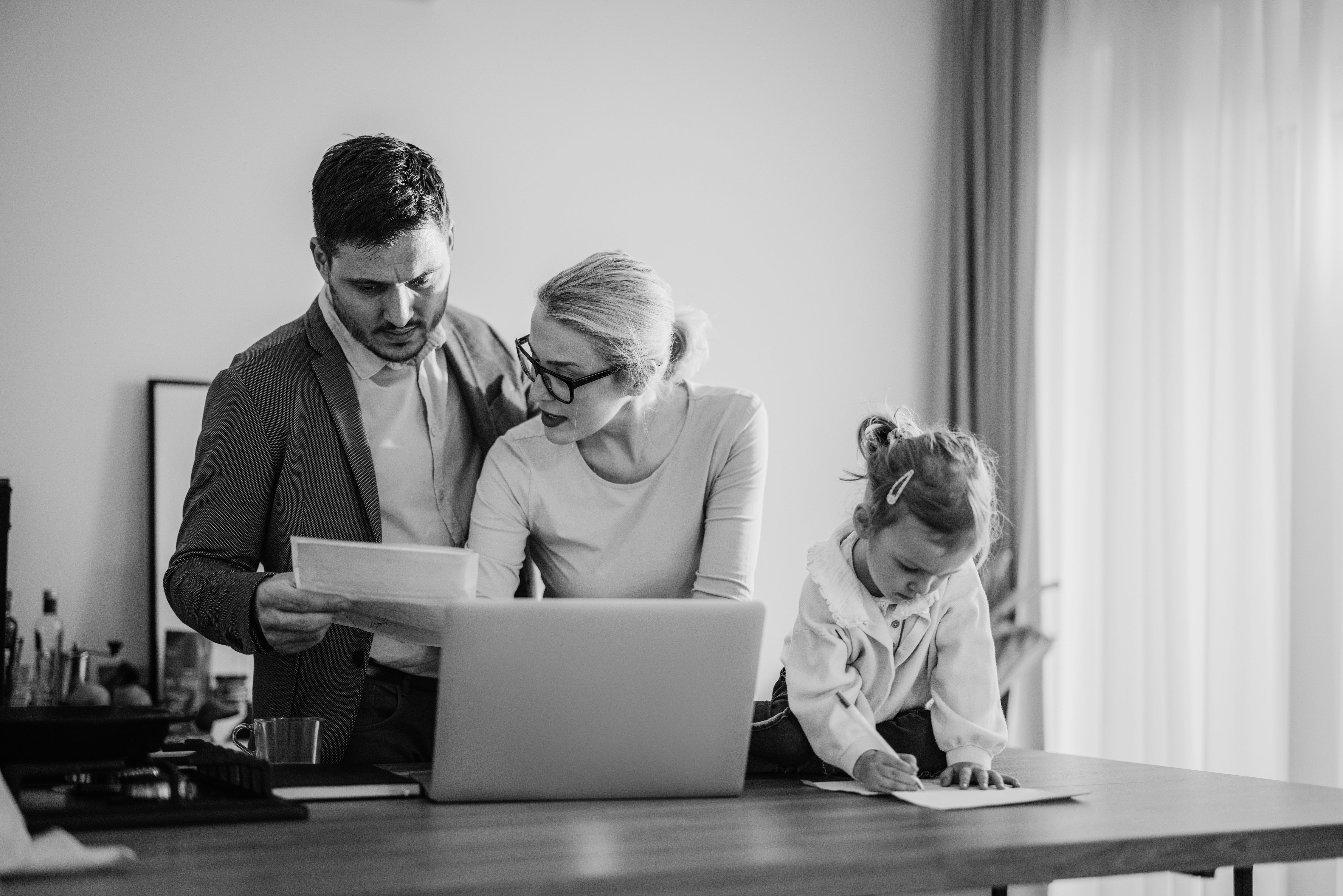 family paying a bill