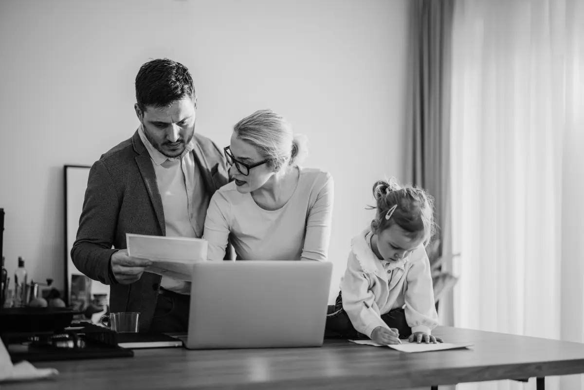 family paying a bill