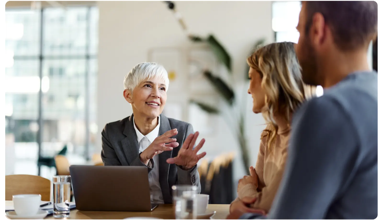 Insurance broker speaking with client