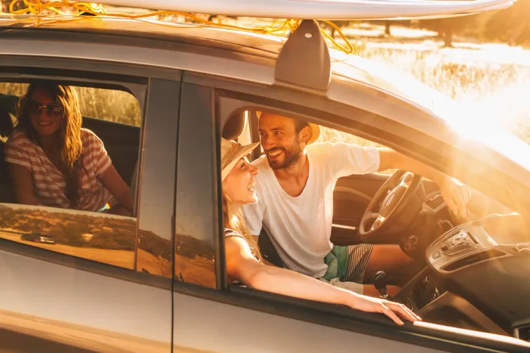 People in car sunset