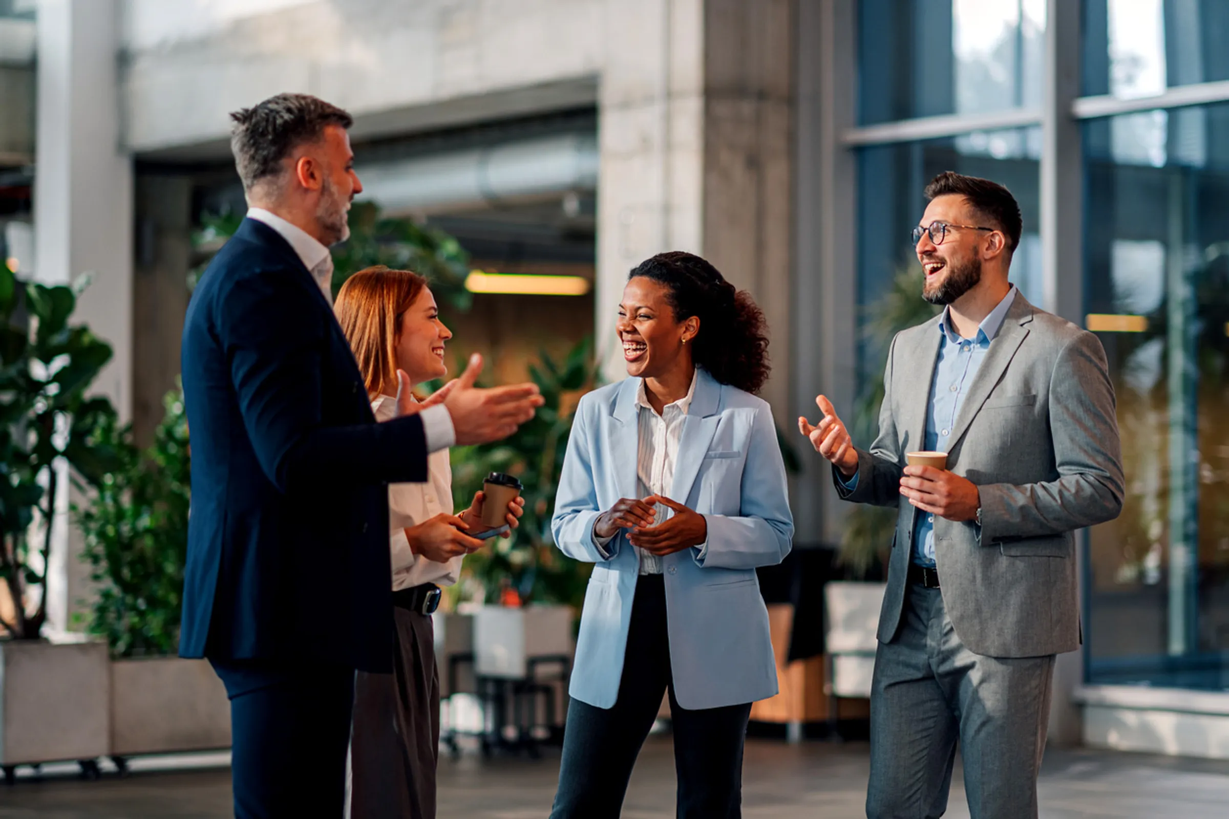 Professionals at coffee catch up networking