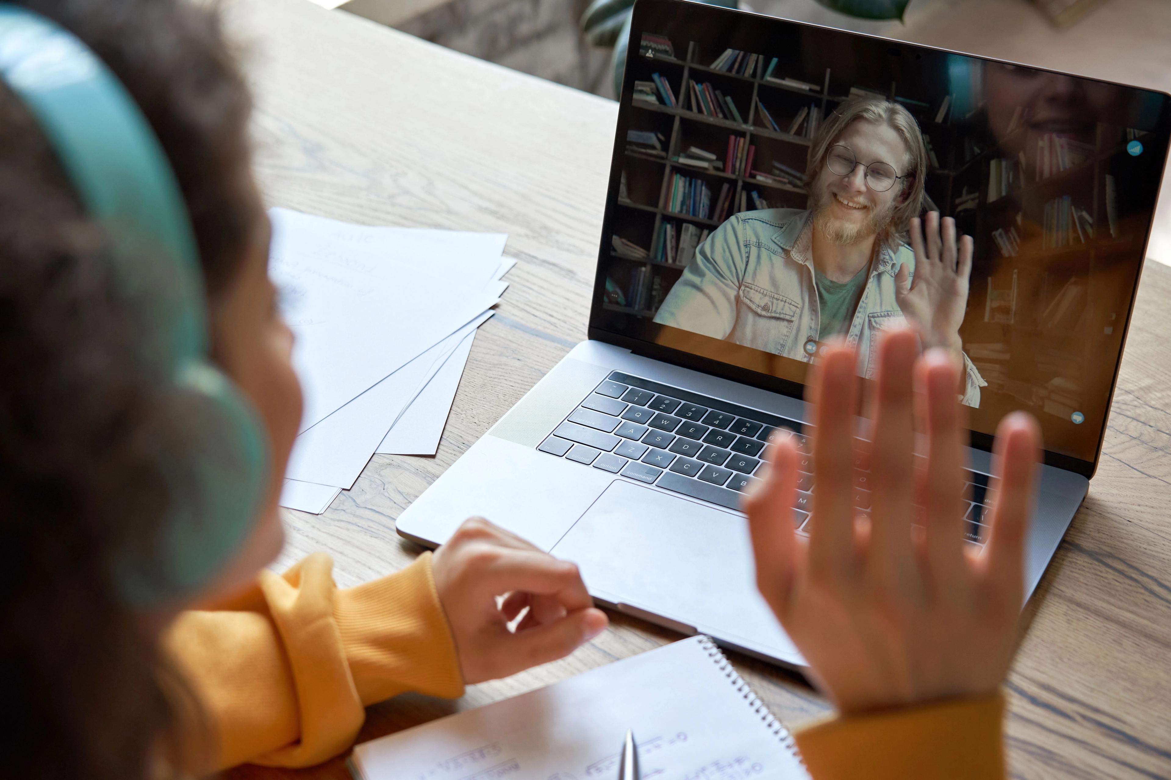 Doctor reviewing a digital care plan on a laptop