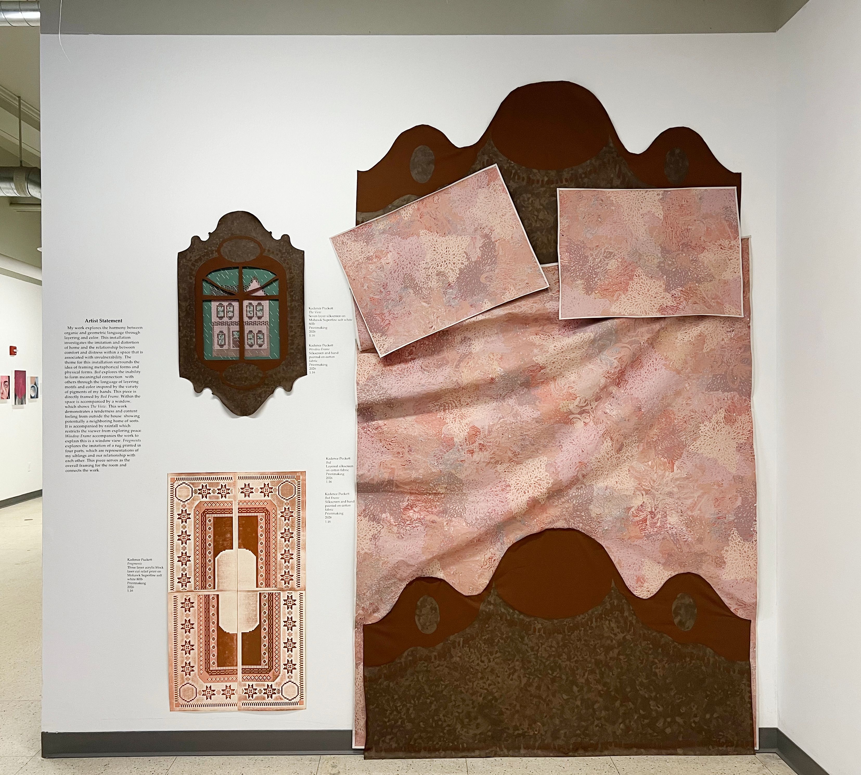 An installation of prints, resembling a beg, a carpet, and a window.
