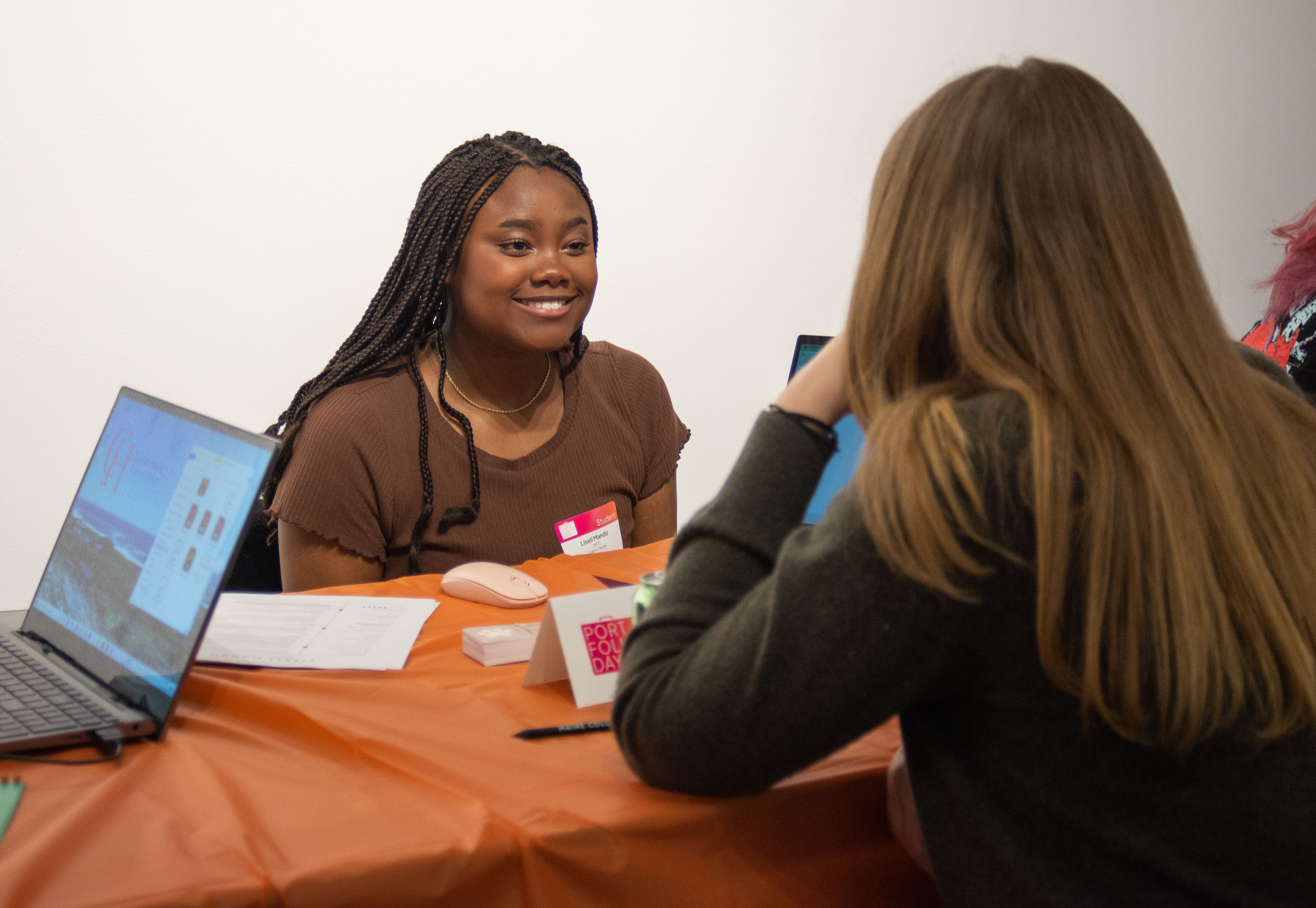 A student presenting their work during a Portfolio Day.