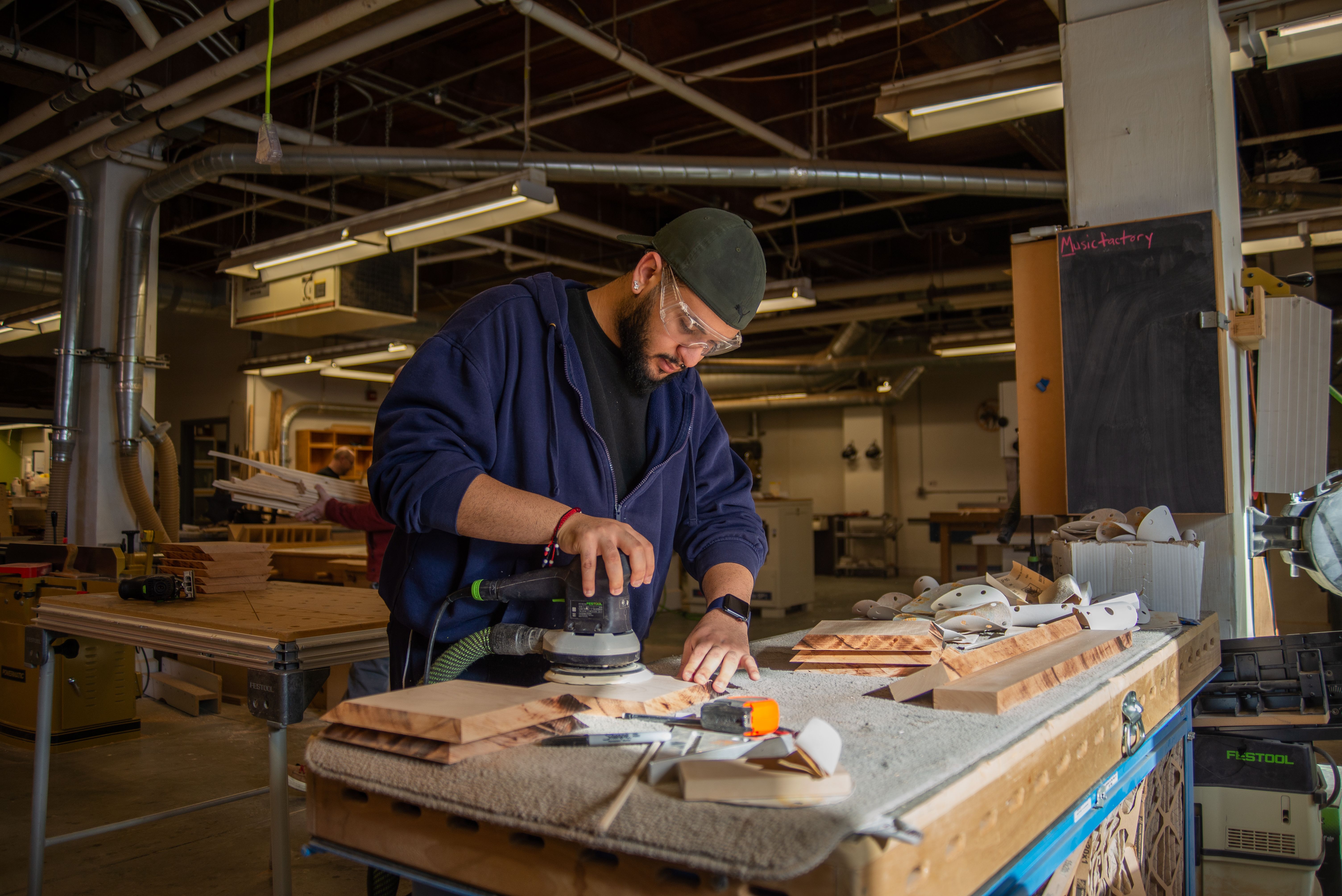 Student working on a piece in the Woodworking and Furniture Design studio.