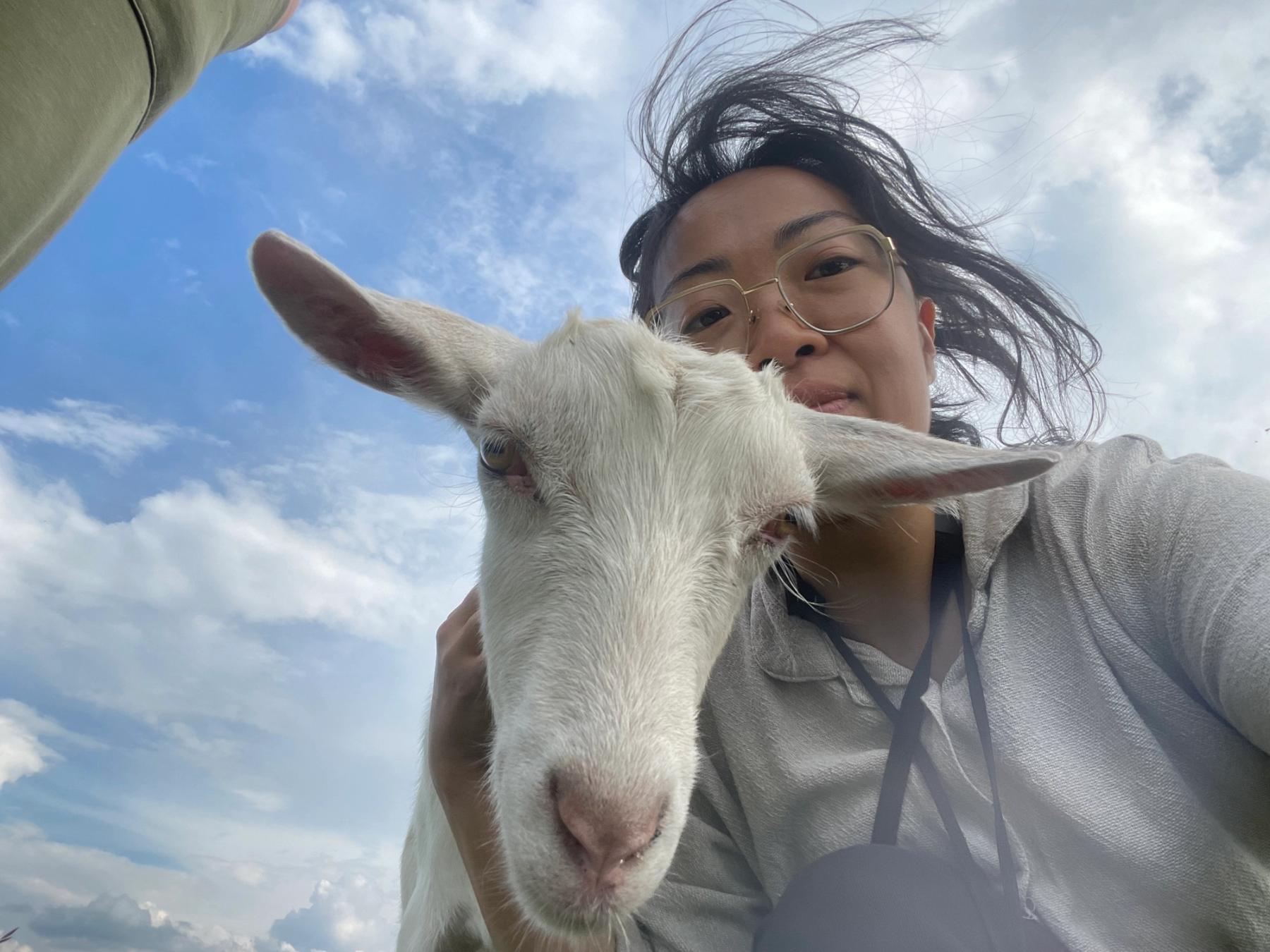 Dawn Kim with a goat.