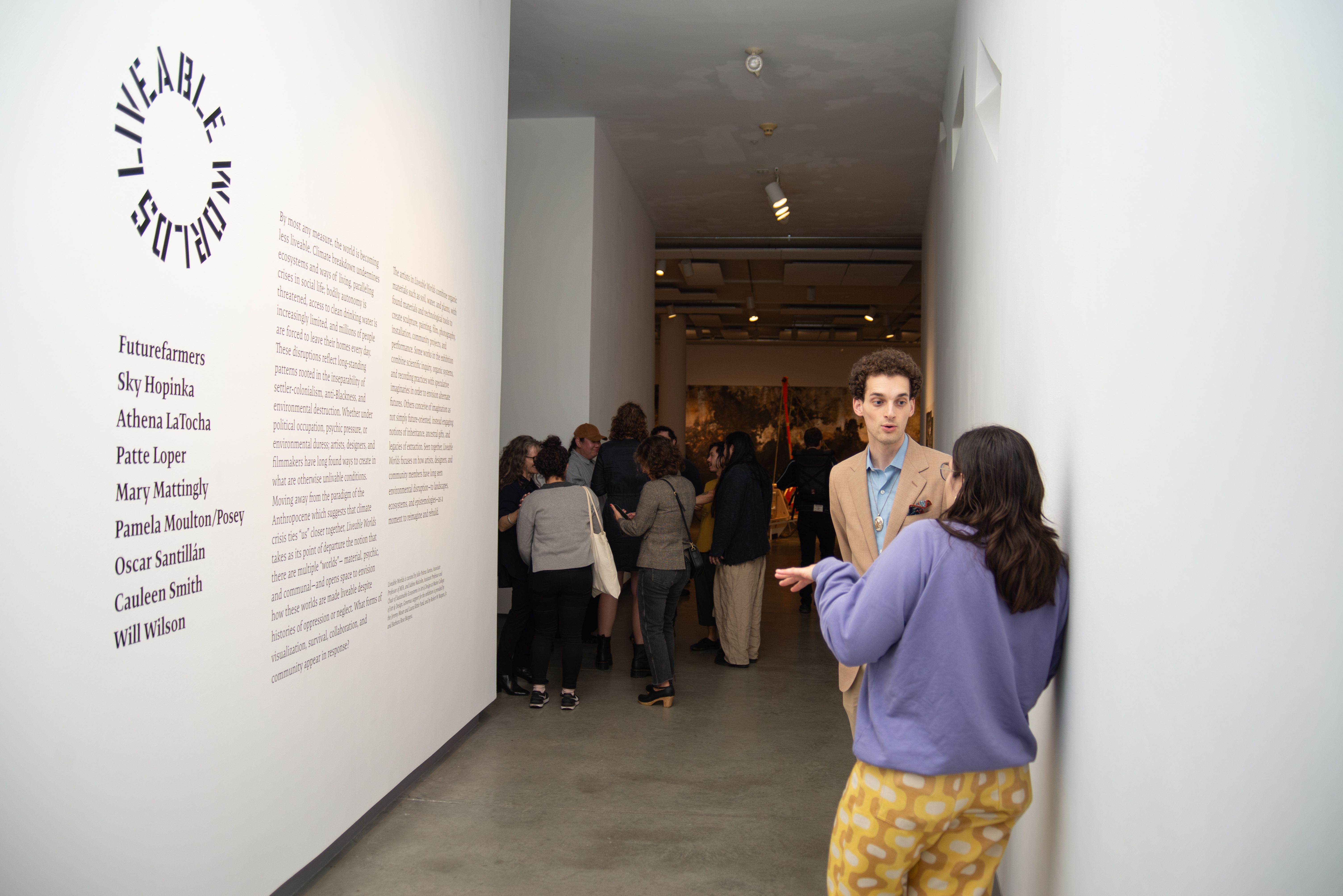 A crowd of people in the ICA during the reception for Livable Worlds.