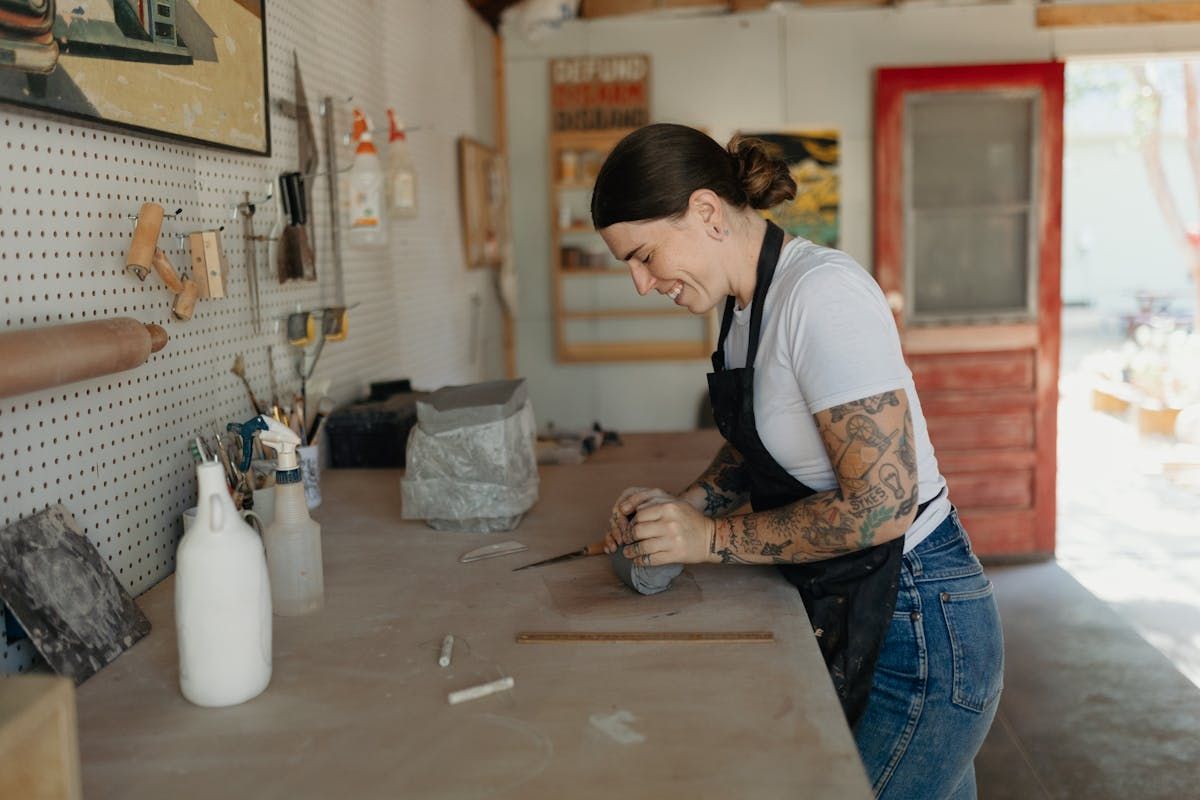 Student kneading clay