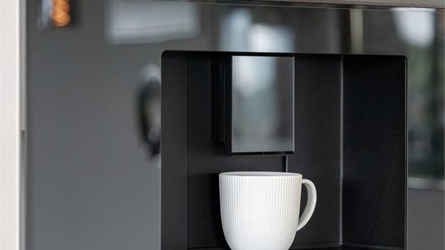 Integrert kaffemaskin fra Siemens for en god start på dagen.