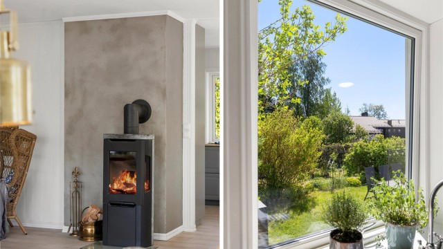 Vedovn fra Jøtul med kleberstein, plassert sentralt mellom kjøkken og stue