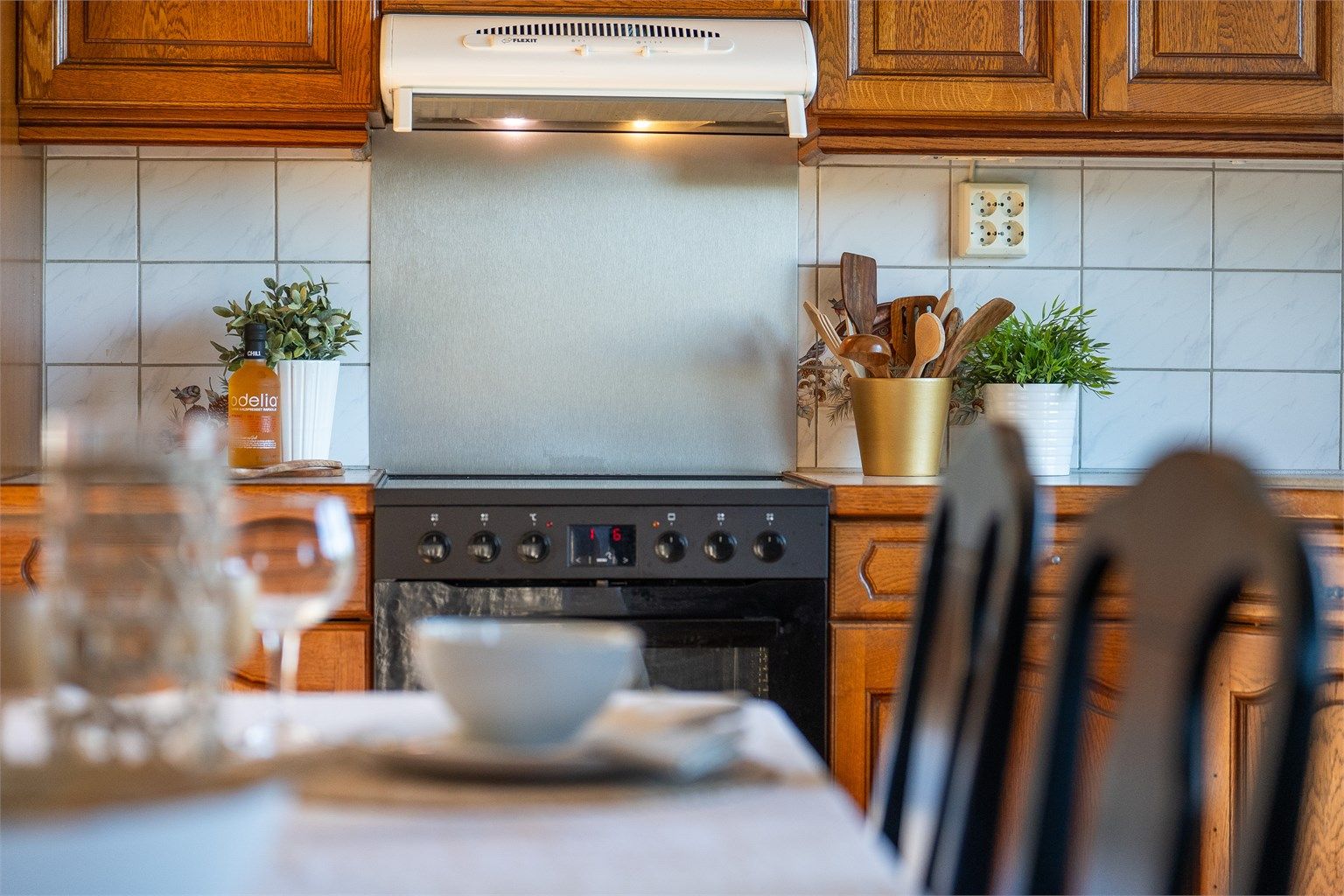 Kjøkkenventilator plassert over kokesonen.