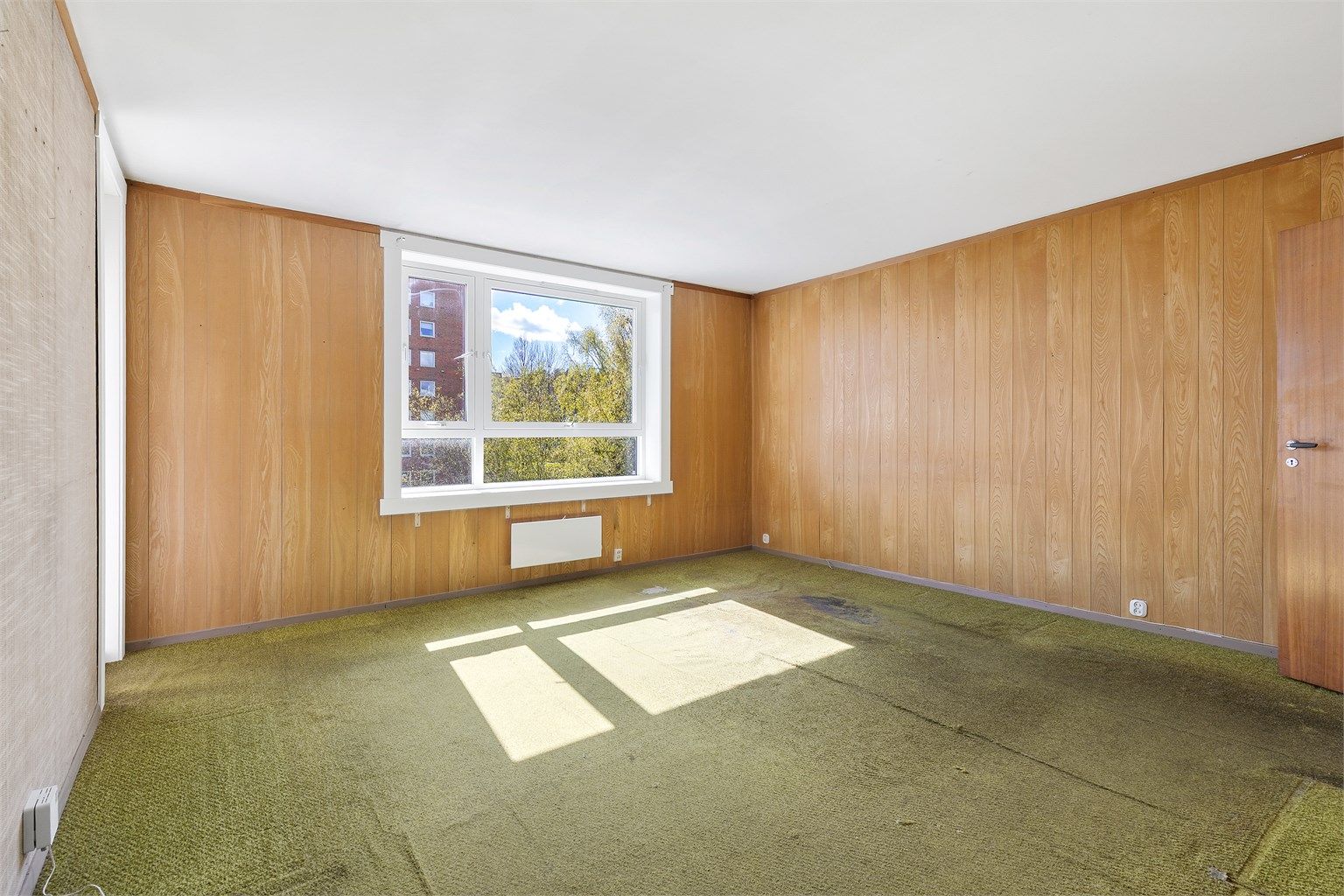 Stuen er av god størrelse med flere muligheter. 