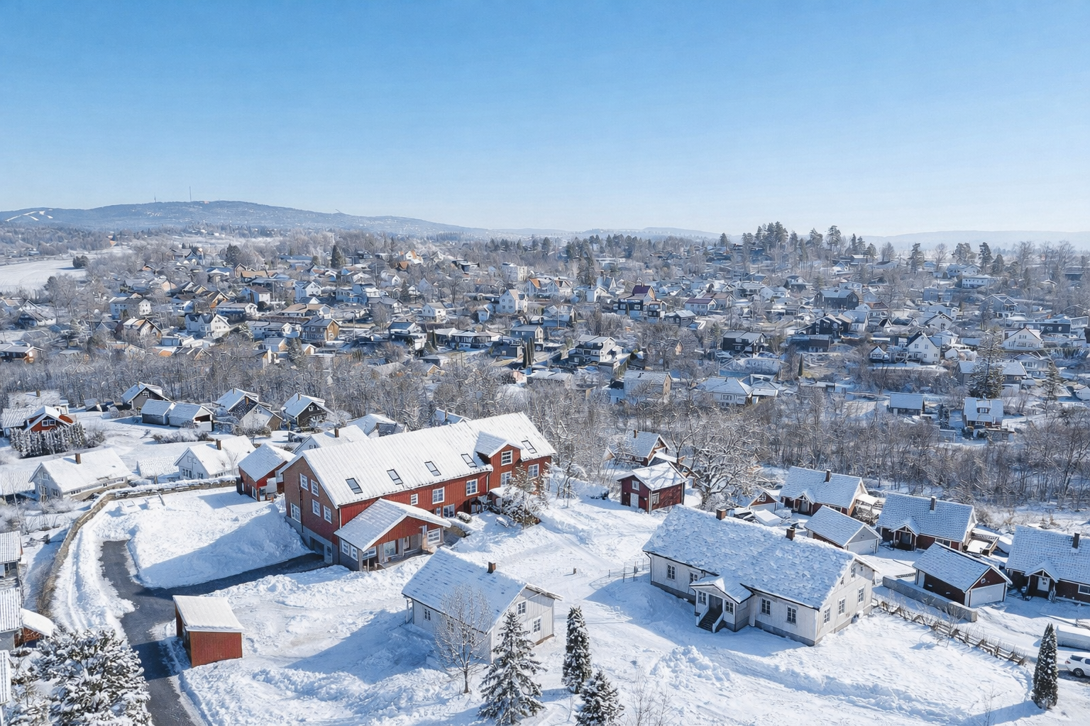 På tidligere Nordre Nes Gård på Haslum kommer nå 6 store og moderne rekkehus i unik låvestil, samt 1 frittliggende enebolig for salg - Redigert vinterbilde Neslia 48 rekkehus