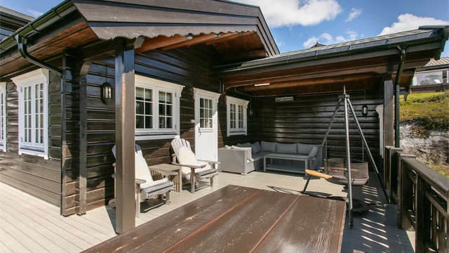 Terrasse med overbygd utestue