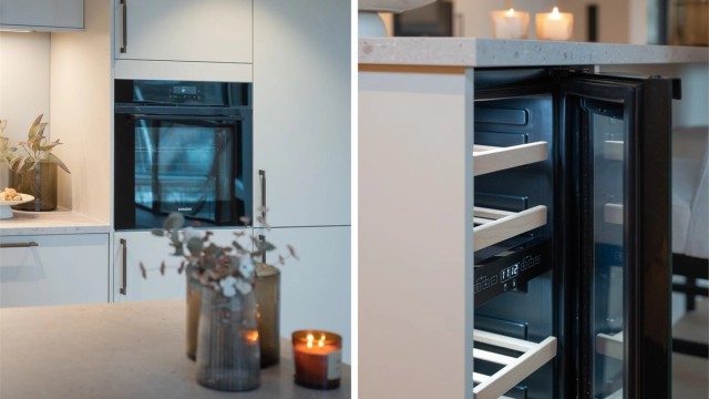 Integrerte hvitevarer som vinkjøler og stekeovn i ergonomisk riktig høyde.