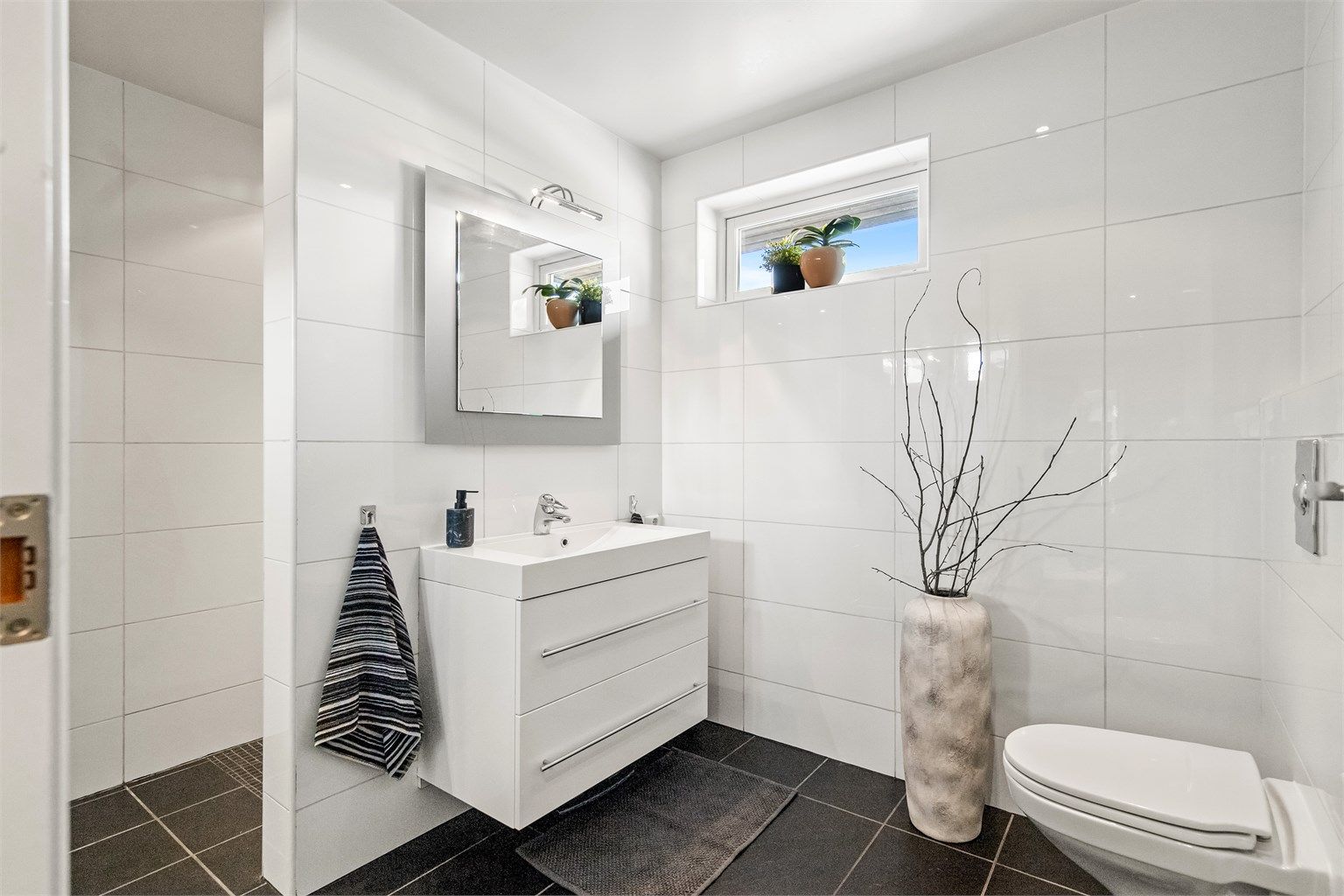 Flislagt bad/wc i mellometasje 