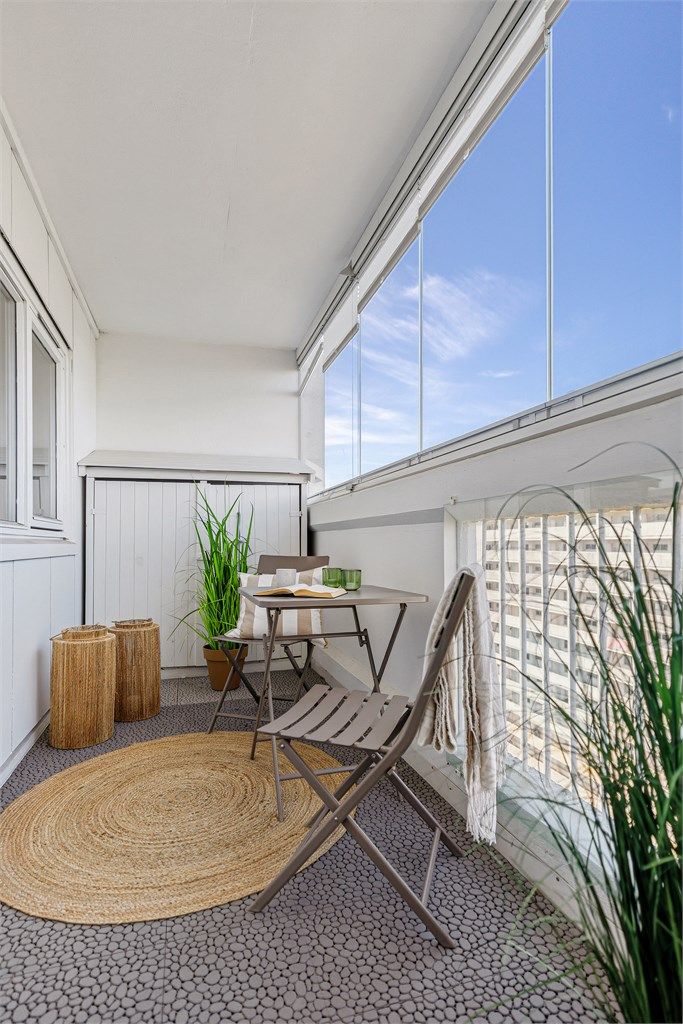 Innglasset balkong som gir en forlengelse av sommeren til langt ut på høsten.
