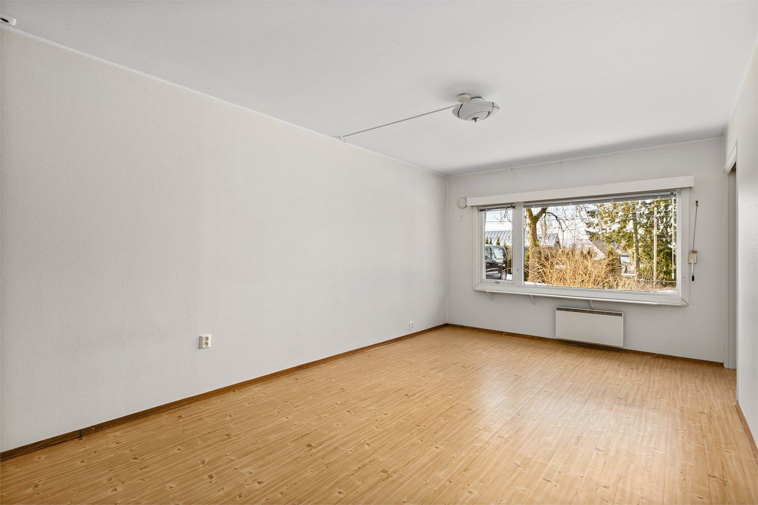 Leiligheten har en fin planløsning med Åpen stue/kjøkkenløsning, soverom med utgang til balkong, romslig entré og stort bad. Foto: Petter Tanum/TanumFoto