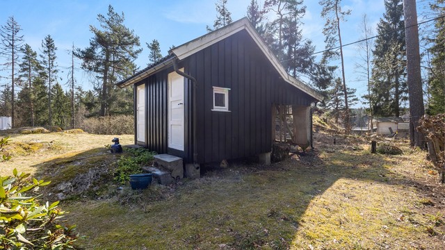 Uthus med lagringsplass