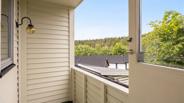 Overbygget nordvendt veranda på 3 kvm.