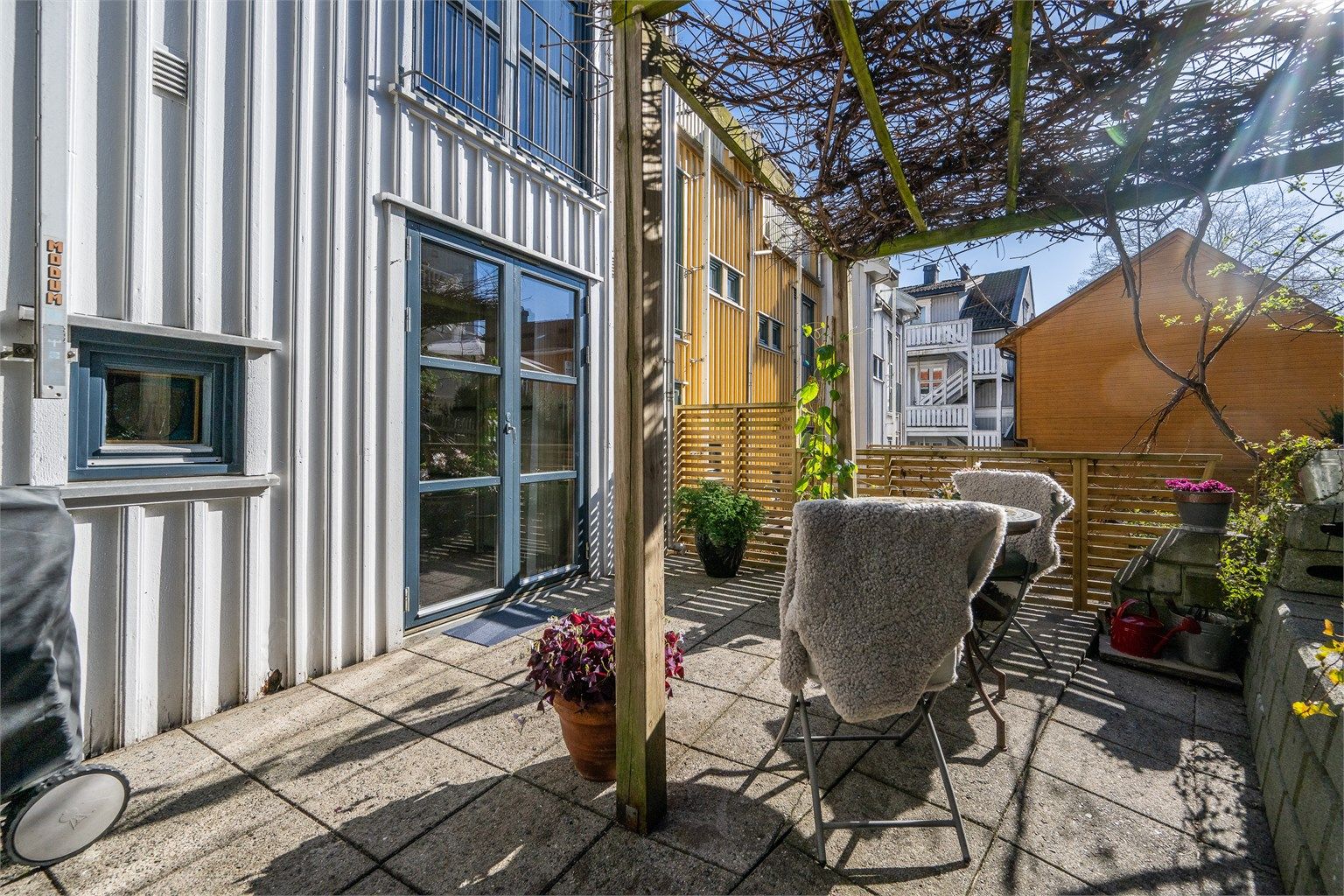 En privat og tilbaketrukket uteplass midt i byen.