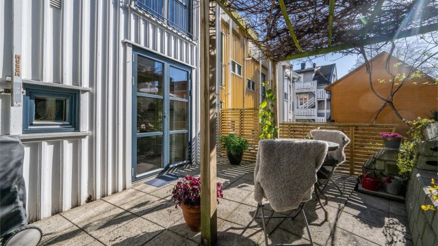 En privat og tilbaketrukket uteplass midt i byen.