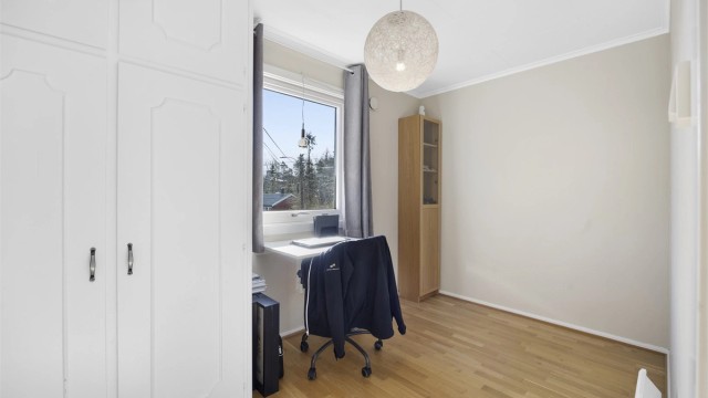 Det tredje soverommet i etasjen egner seg godt som kontor eller gjesterom.