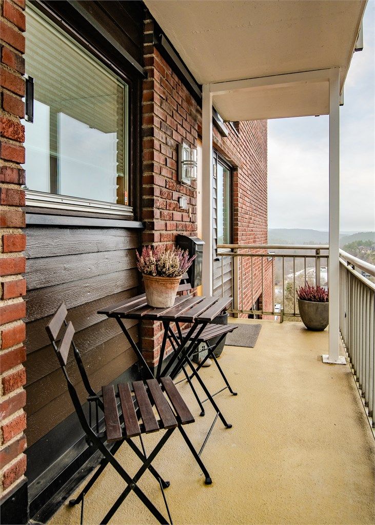 En hyggelig og overbygget inngangssone.