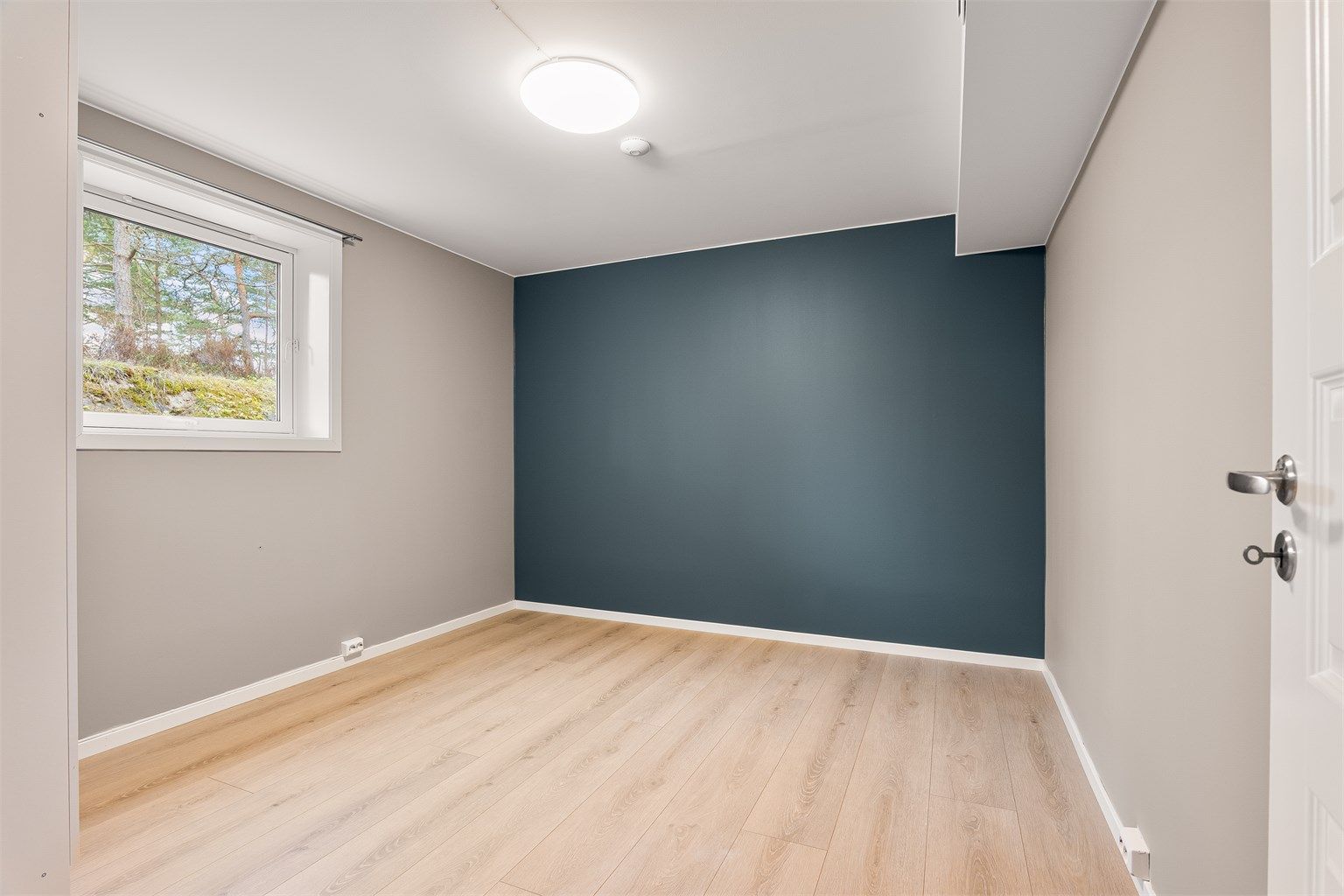 Soverom II har nær 11 kvm. gulvflate.