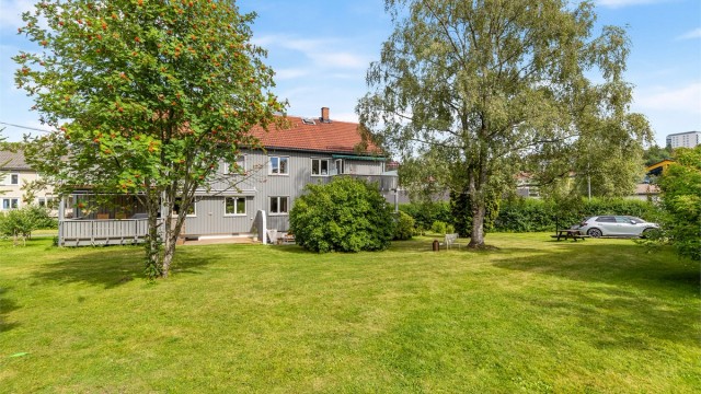 Fasaden sett fra borettslagets felles hage