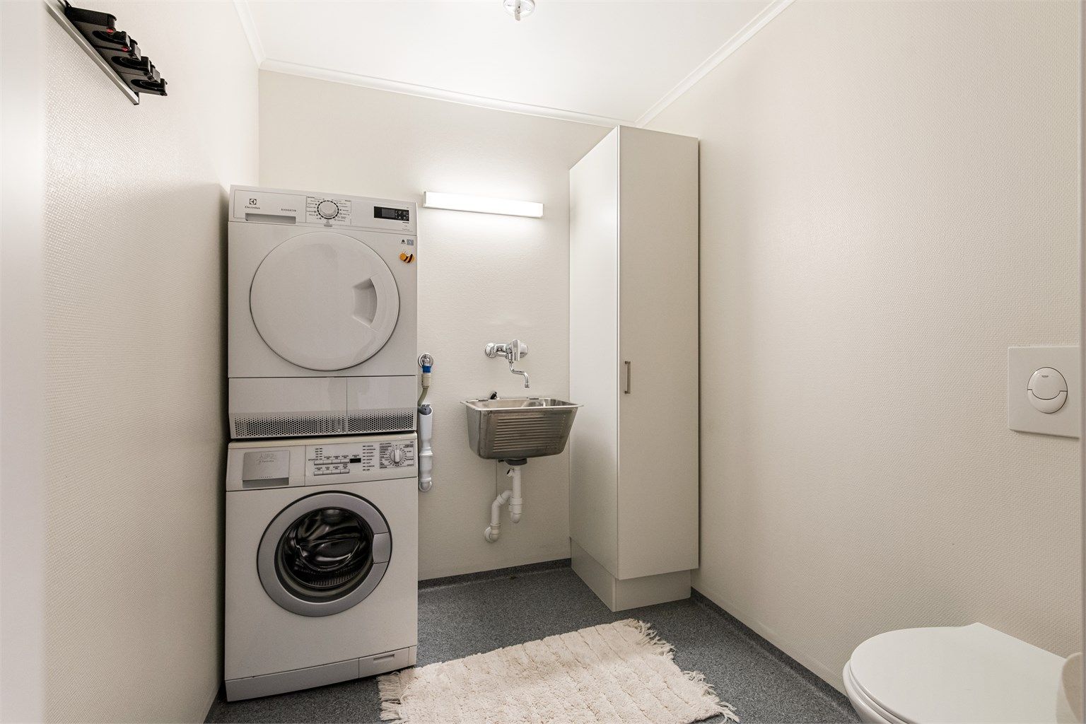 Vaskerom med ekstra toalett er en praktisk løsning