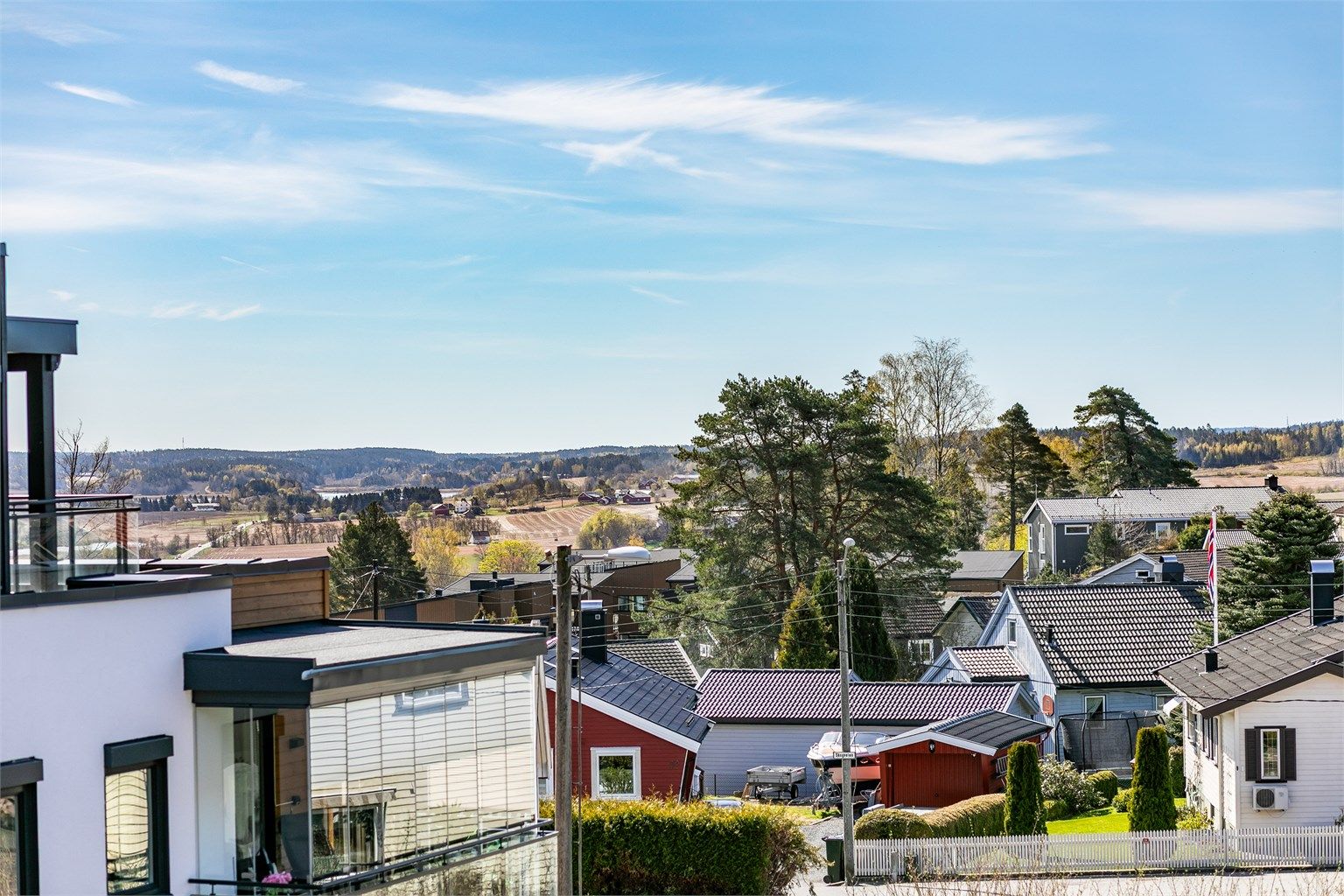 Utsikt til Skinnerflo over jordbrukslandskapet på Rådesletta - fremhevet med zoom.