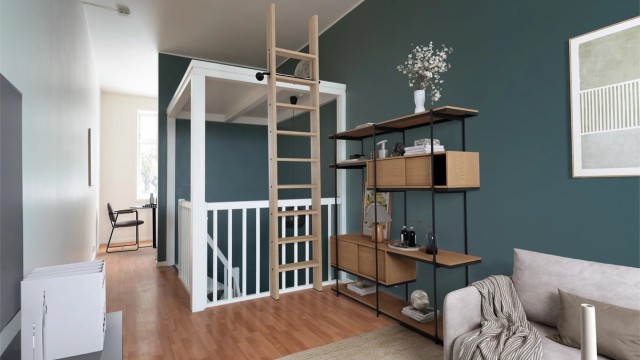 Det er lagt opp til en smart studioløsning over trappeoppgangen. Bildet viser en illustrert innredning.
