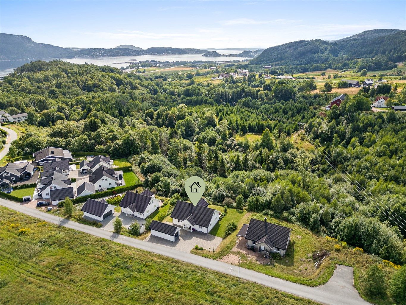 Tilbaketrukket område med omkringliggende landbruksarealer og naturvernområde.
Foto: Stine Prøitz Jørgensen