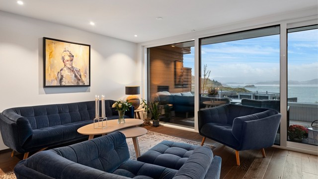 Koselig sofakrok i deler av stuen i tilknytning til kjøkken