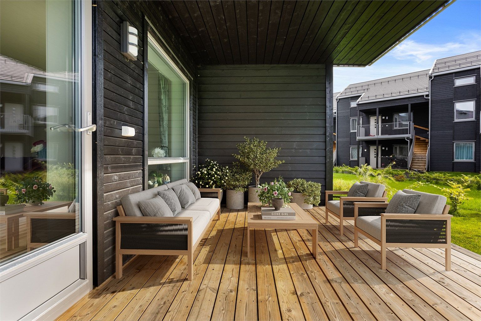 Terrassen er digitalt stylet for å vise muligheter for møblering og utnyttelse av uteplassen.