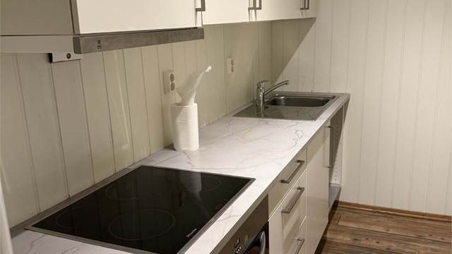 Bod i underetasje innredet som kjøkken