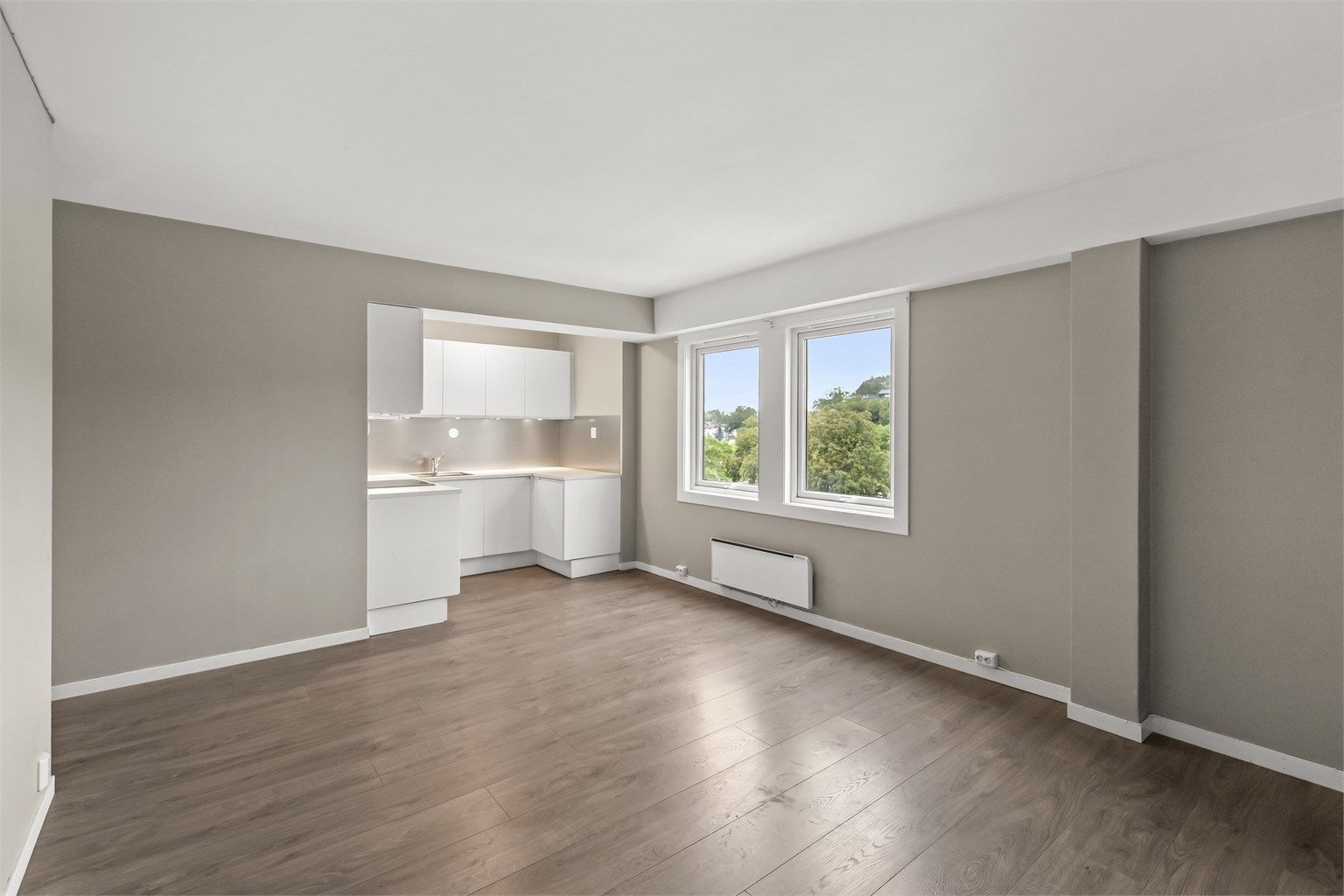 Stue og kjøkken ligger i åpen løsning