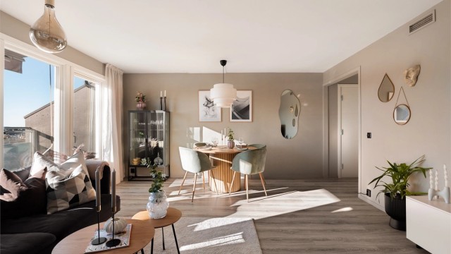 Glatte flater på både vegger og himlinger kombinert med listefri overgang skaper et moderne uttrykk.