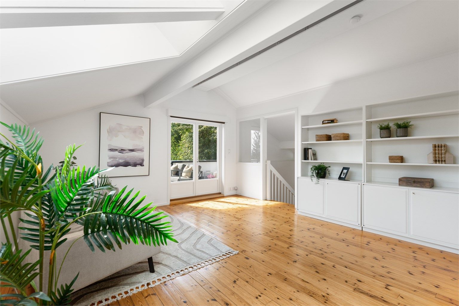 I øverste etasje har du en flott loftstue