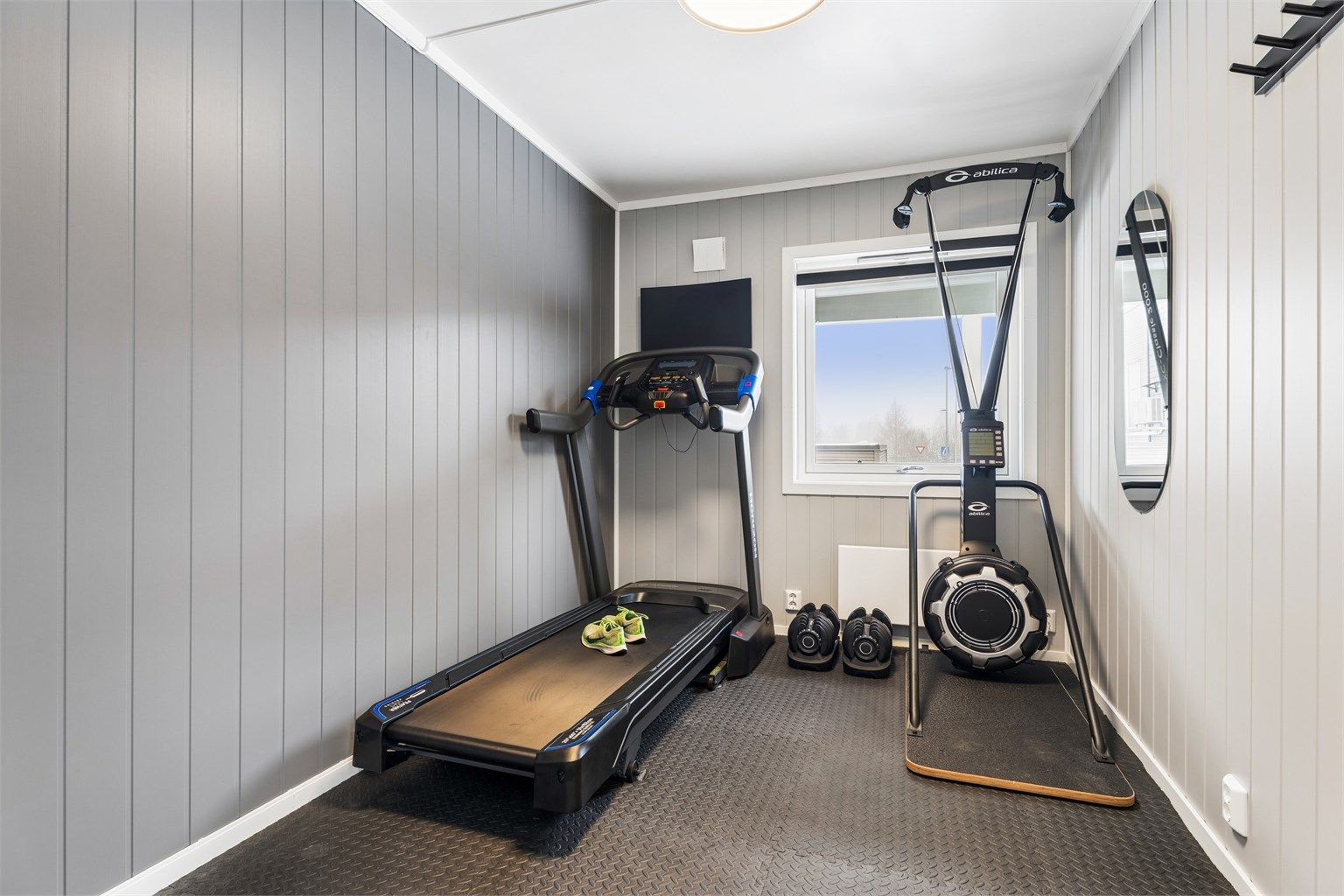 Det siste soverommet er i dag innredet som treningsrom.